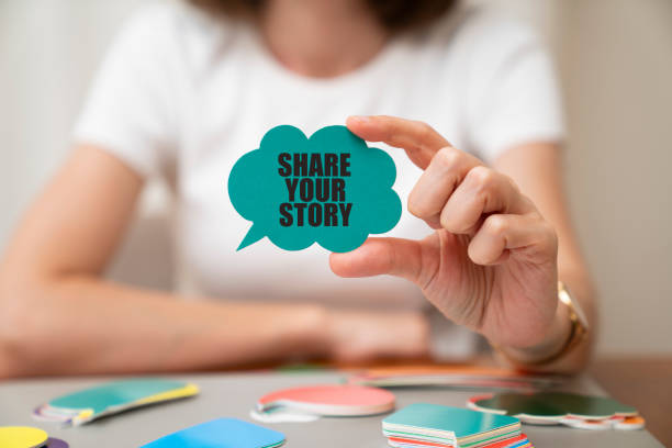 Woman wearing white t-shirt holding paper card bubble. Share  your story message on speech bubble.